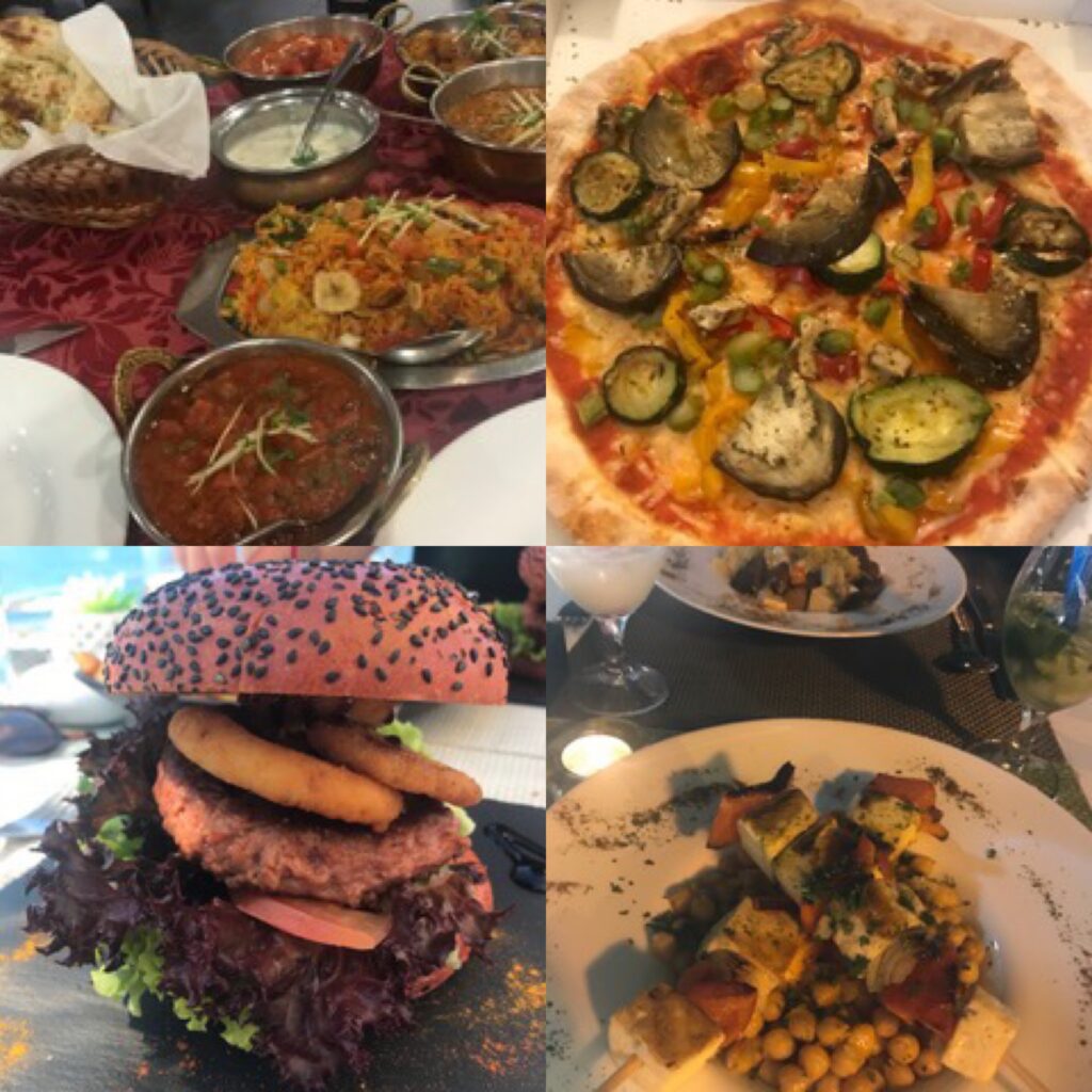 Some of our favourite dishes from when we visited Madeira. Image shows a burger, pizza, indian food and tofu skewers.